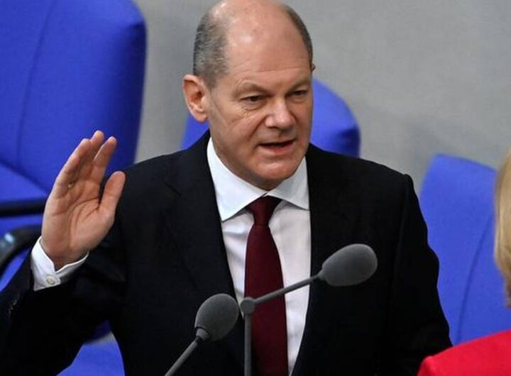 Olaf Scholz takes reins from Angela Merkel for new German era